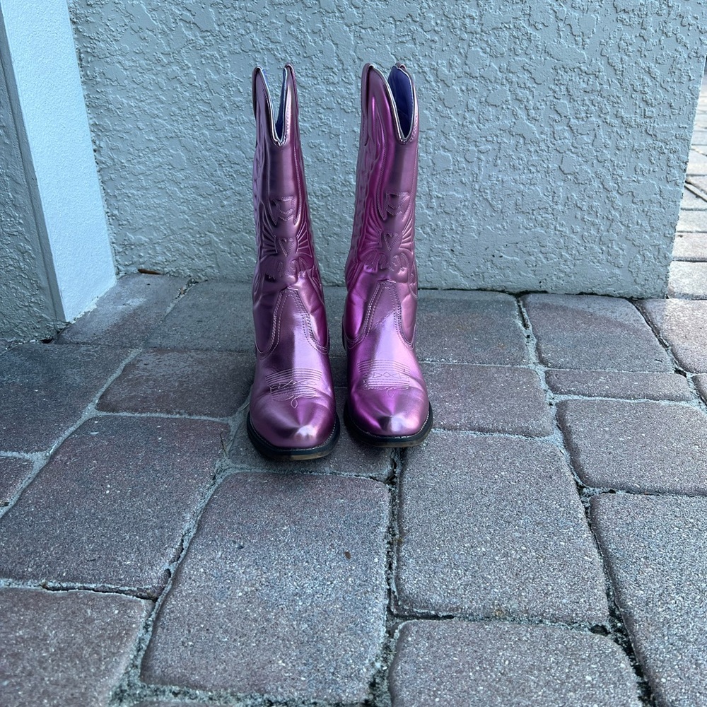 Pink cowboy boots in size 6 worn only wants to the Taylor Swift concert.
